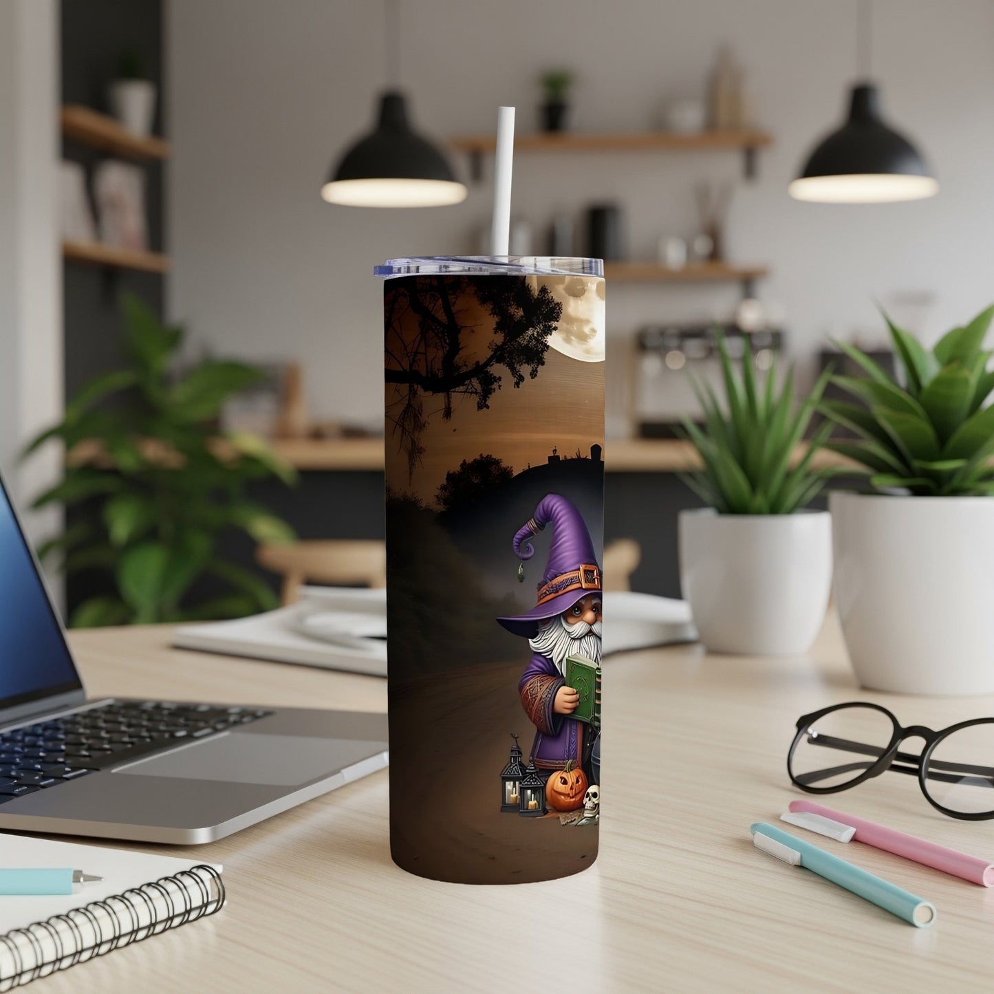 Tall tumbler with a wizard, pumpkin, and skulls on a spooky moonlit background.