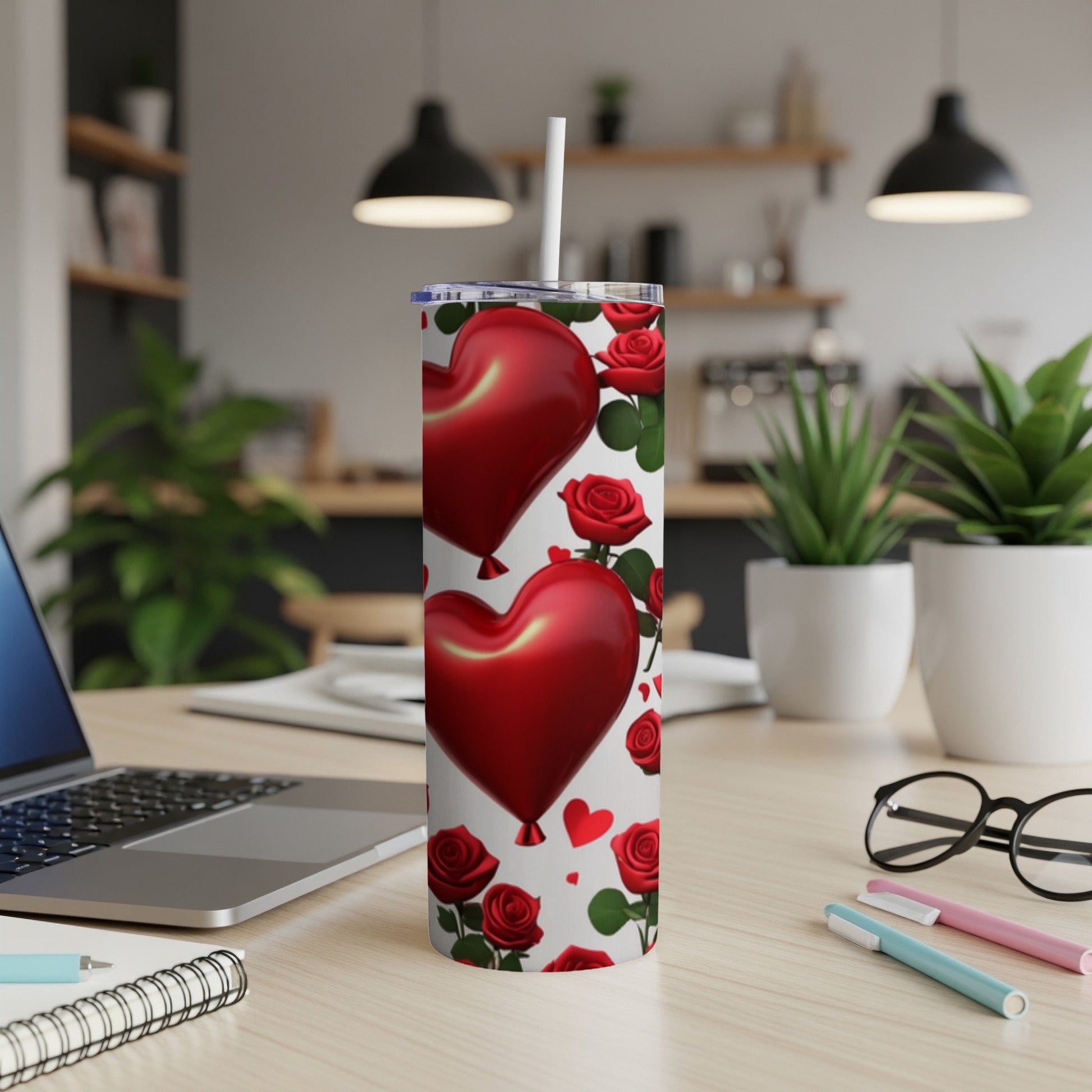 Red heart balloons and roses pattern on a white tumbler with a straw.