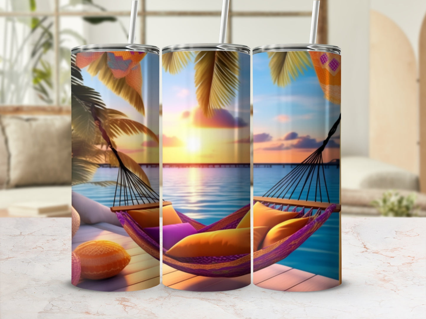 Beach hammock with colorful pillows and sunset over the ocean.
