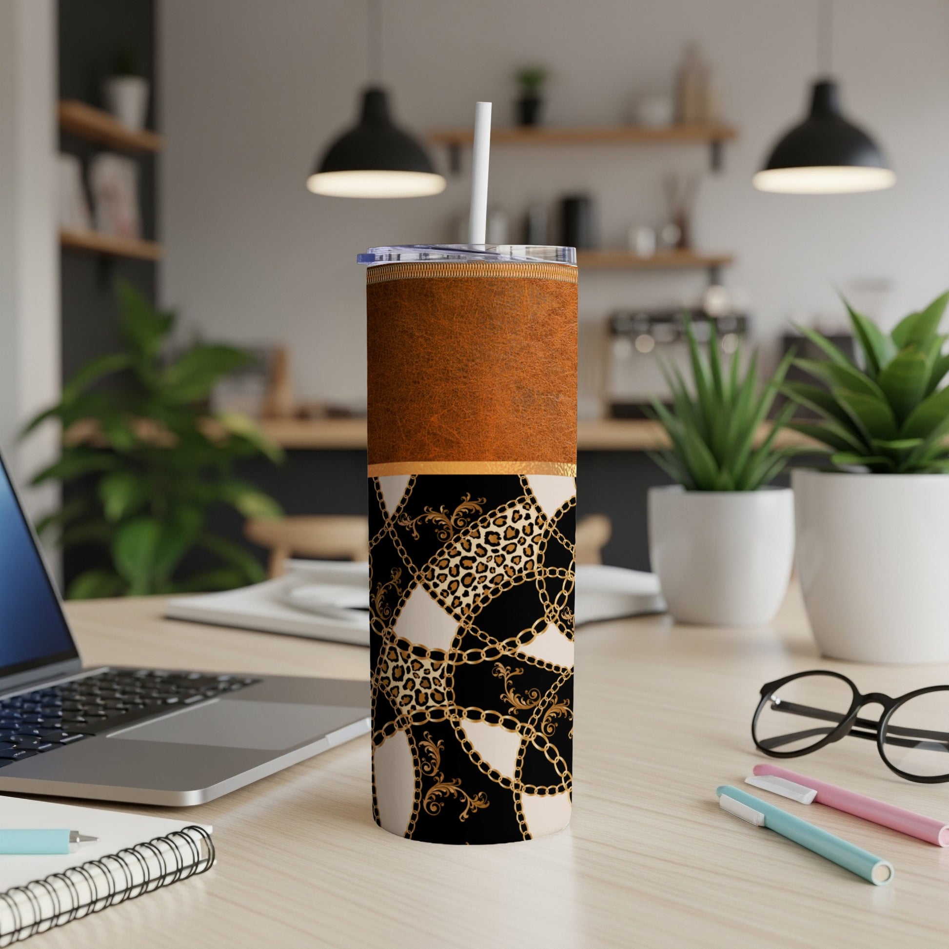 Tumbler with brown texture and black, beige, gold chain, and leopard print design.