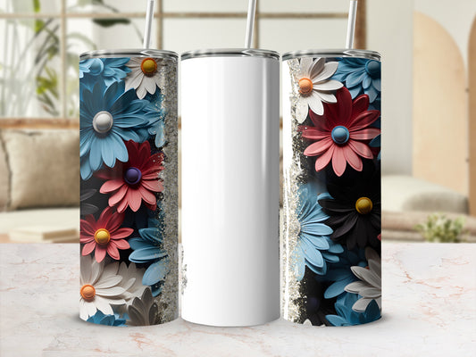 White tumbler with colorful floral pattern and glitter accents.