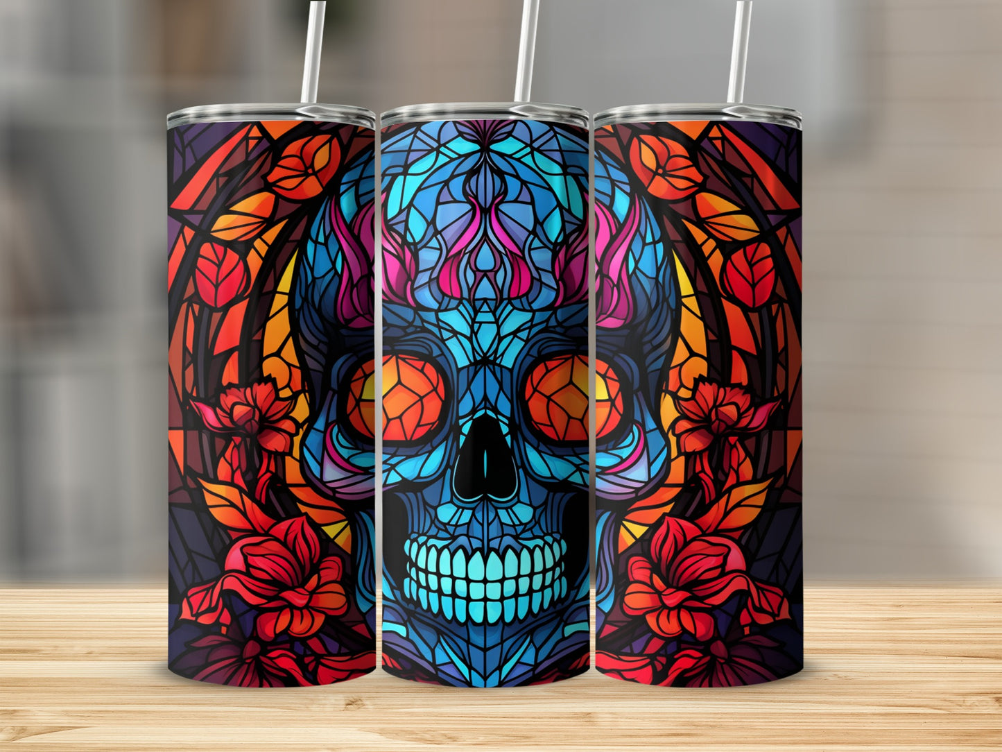 Stained glass skull with floral accents on a patterned tumbler.