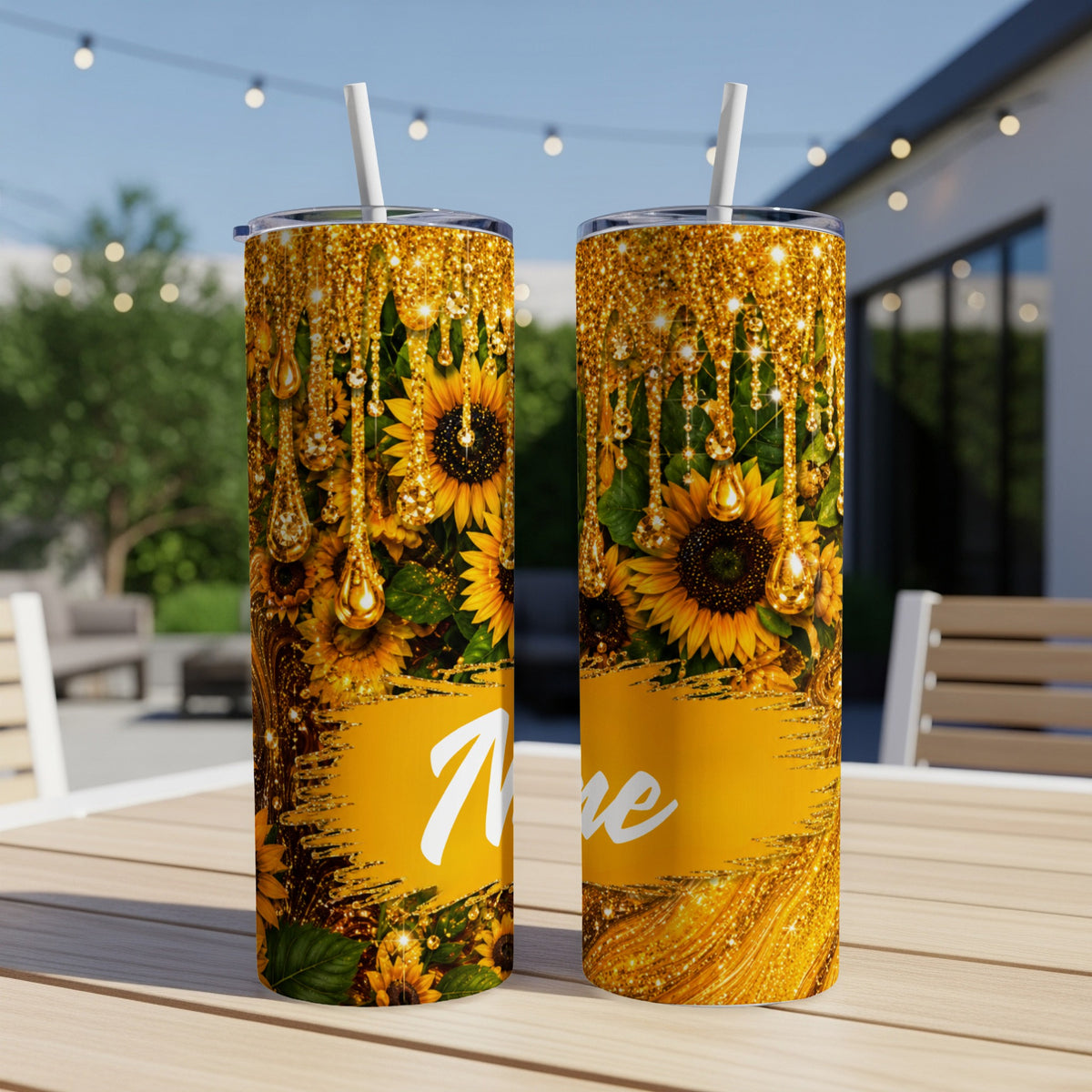 Two tumblers with sunflower and gold glitter design, one says "Ne".