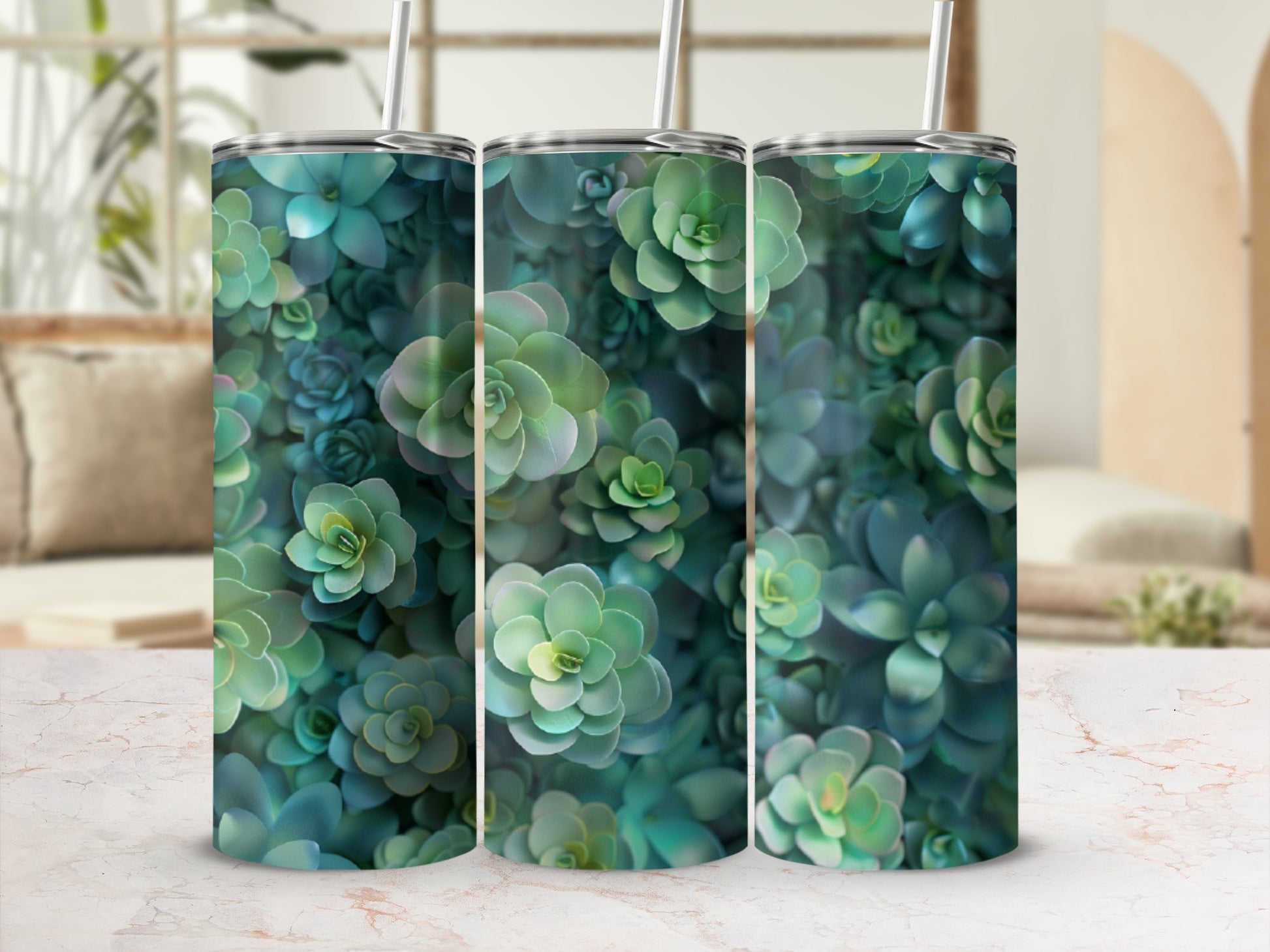 Green and blue succulents pattern on a cylindrical tumbler with straw.