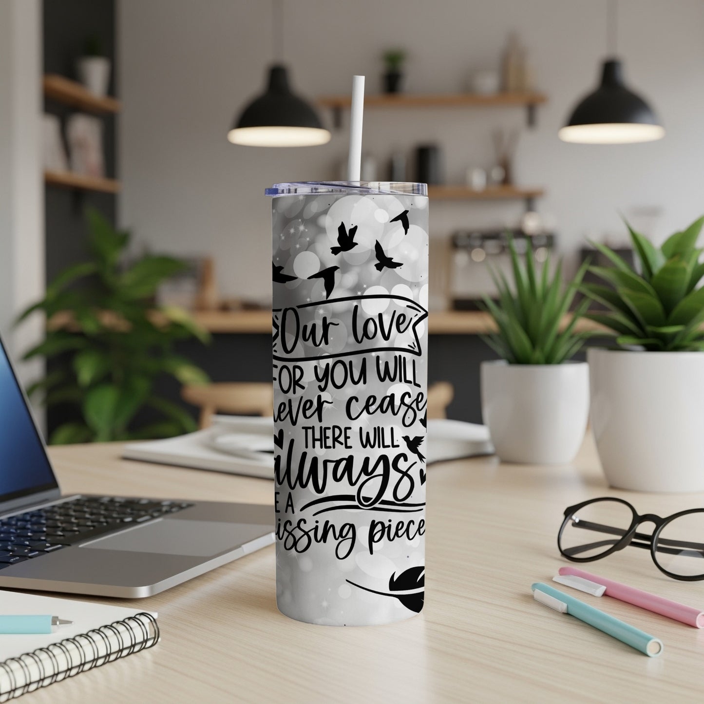 Tumbler with flock of birds and text "Our love for you will never cease. There will always be a missing piece."