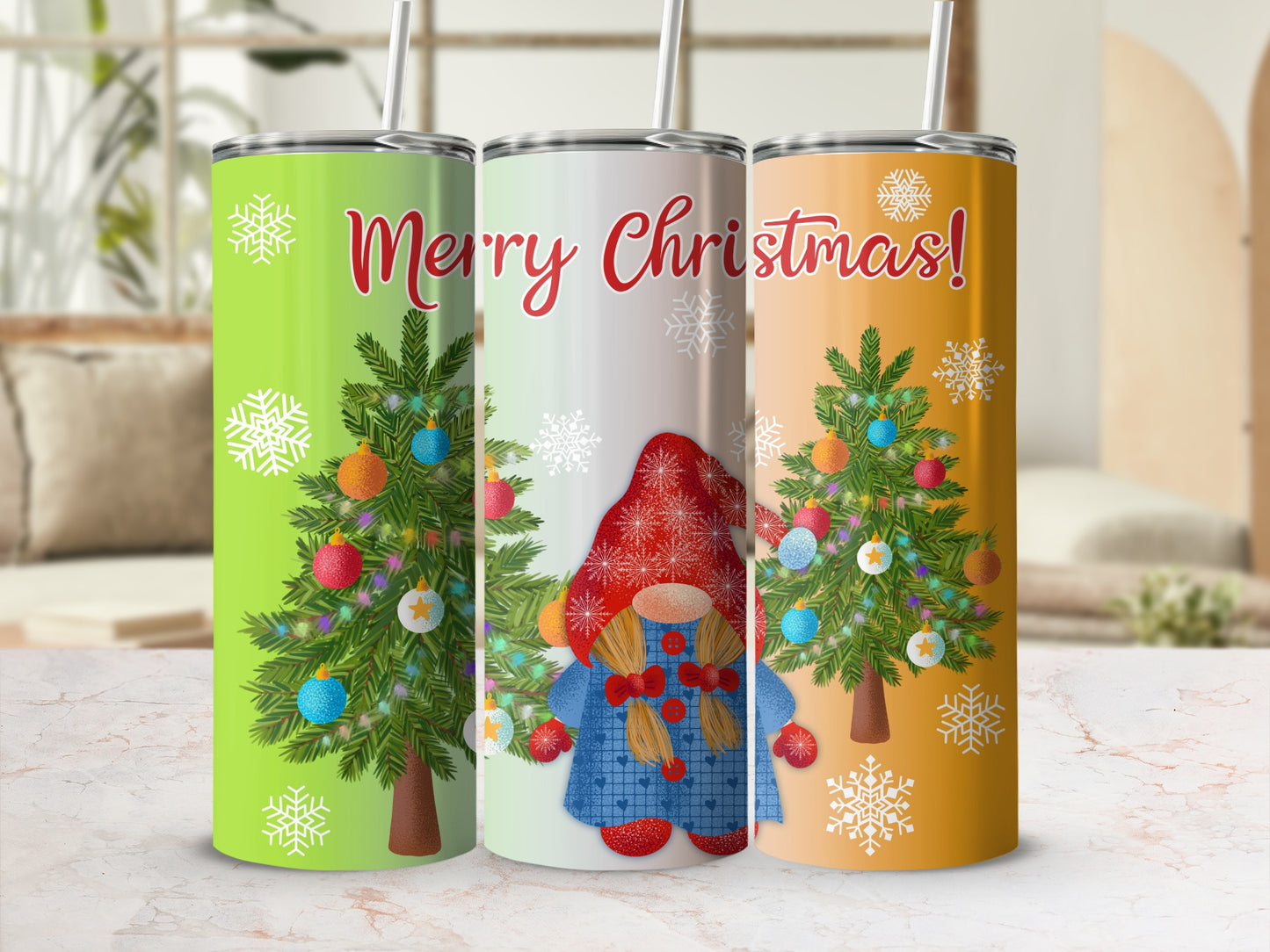 Three Christmas-themed tumblers with festive gnomes and trees.