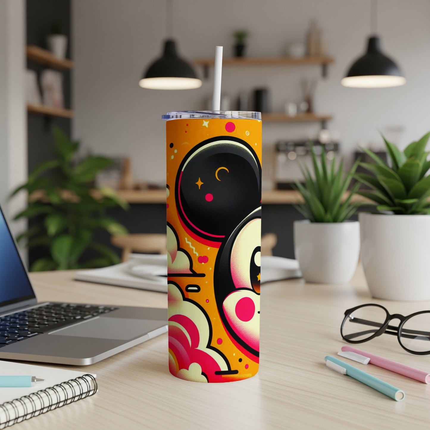 Orange tumbler with black Mickey Mouse ears and colorful abstract shapes.