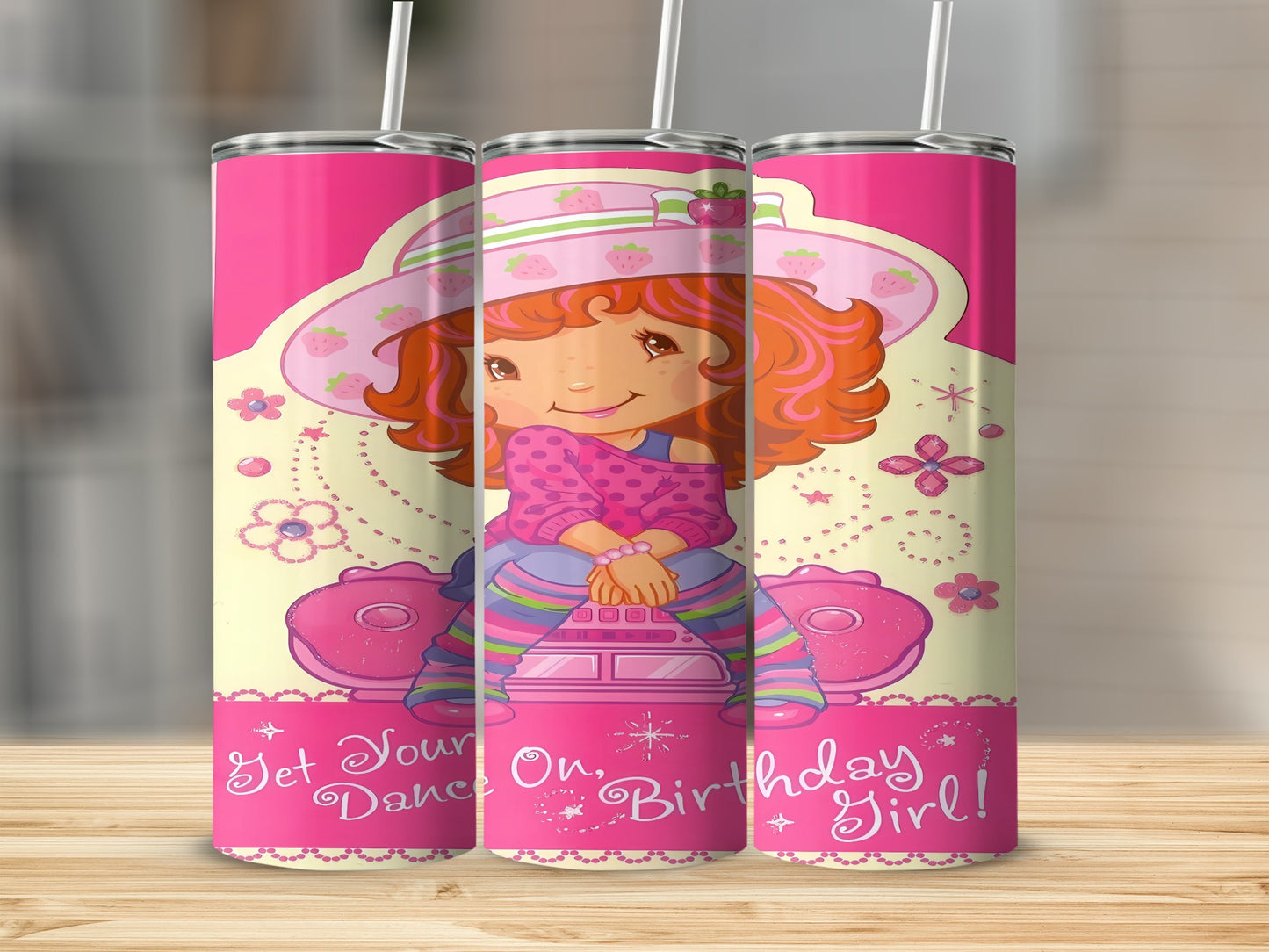 Strawberry Shortcake sitting on a pink scooter, "Get Your Dance On, Birthday Girl!"