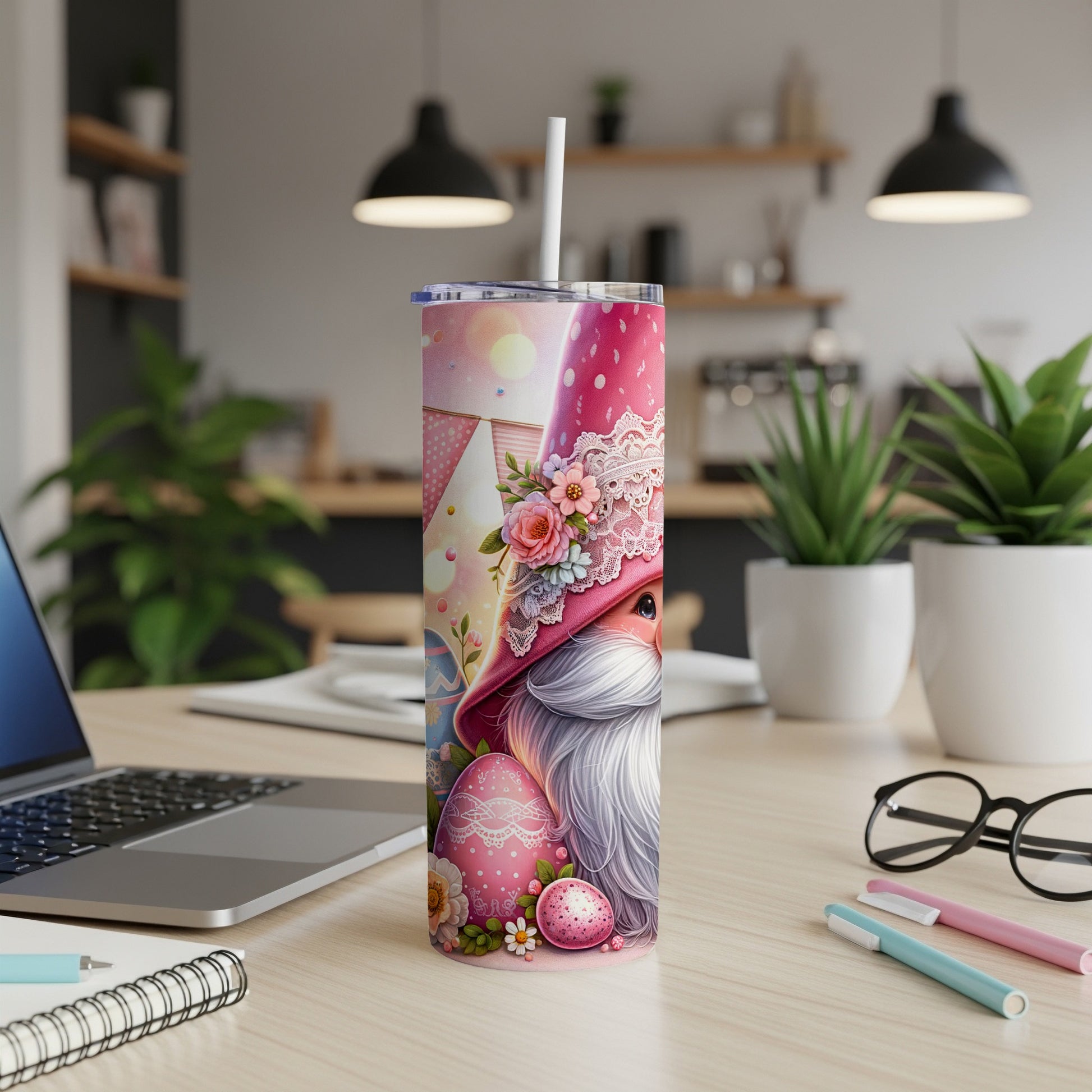 Pink gnome tumbler with Easter eggs and floral accents.