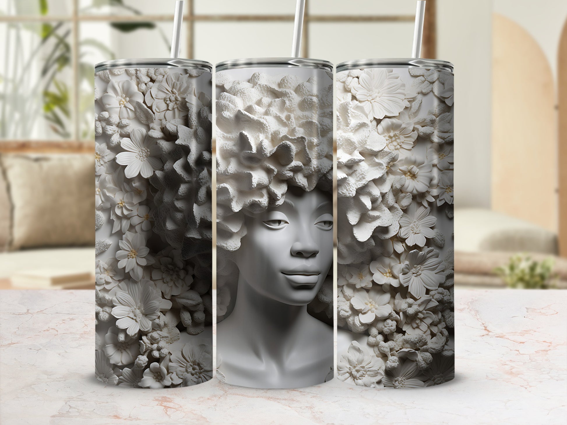 White floral textured tumbler with a woman's face emerging from the blooms.