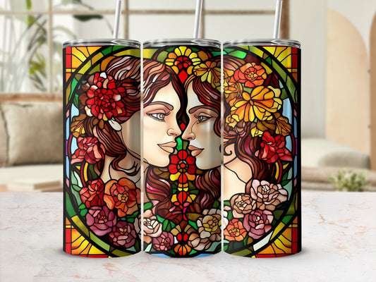 Triptych of tumblers featuring stained glass art of two women with floral adornments.
