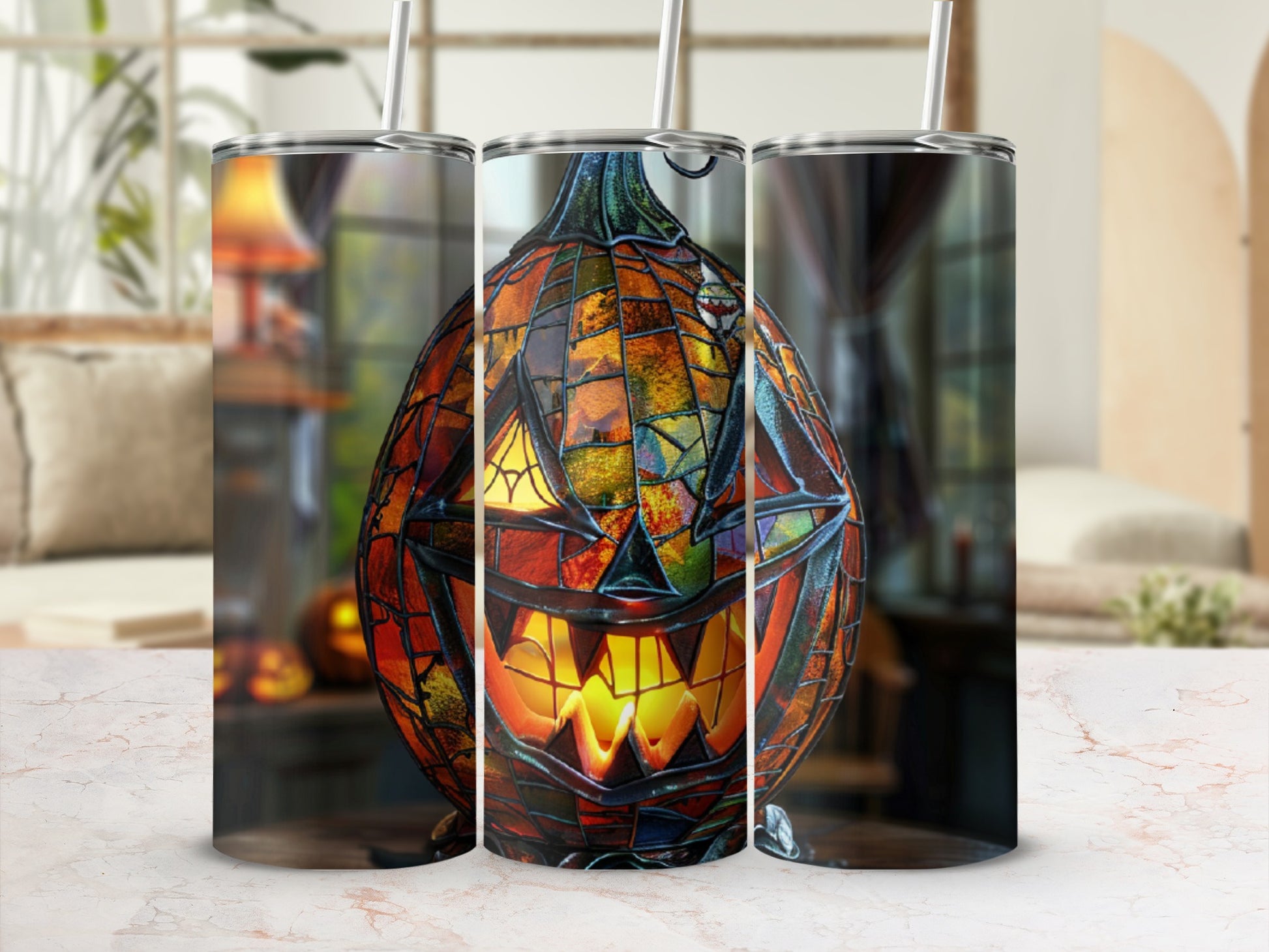 Three tumblers with stained glass jack-o'-lantern designs.