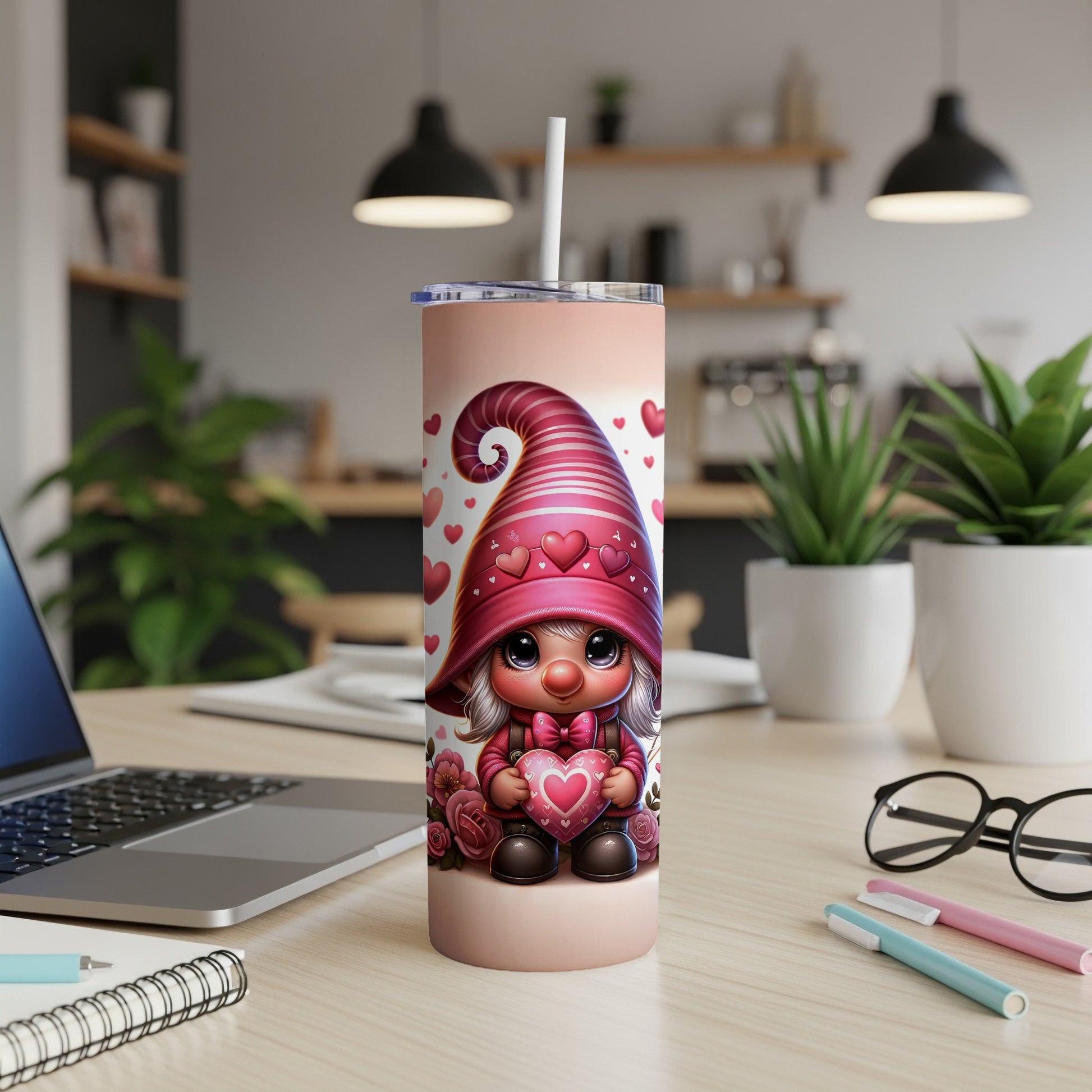 Pink gnome with hearts on tumbler and straw, holding a heart.