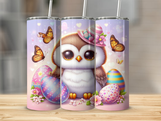 Cute owl wearing a pink hat with butterflies and Easter eggs.