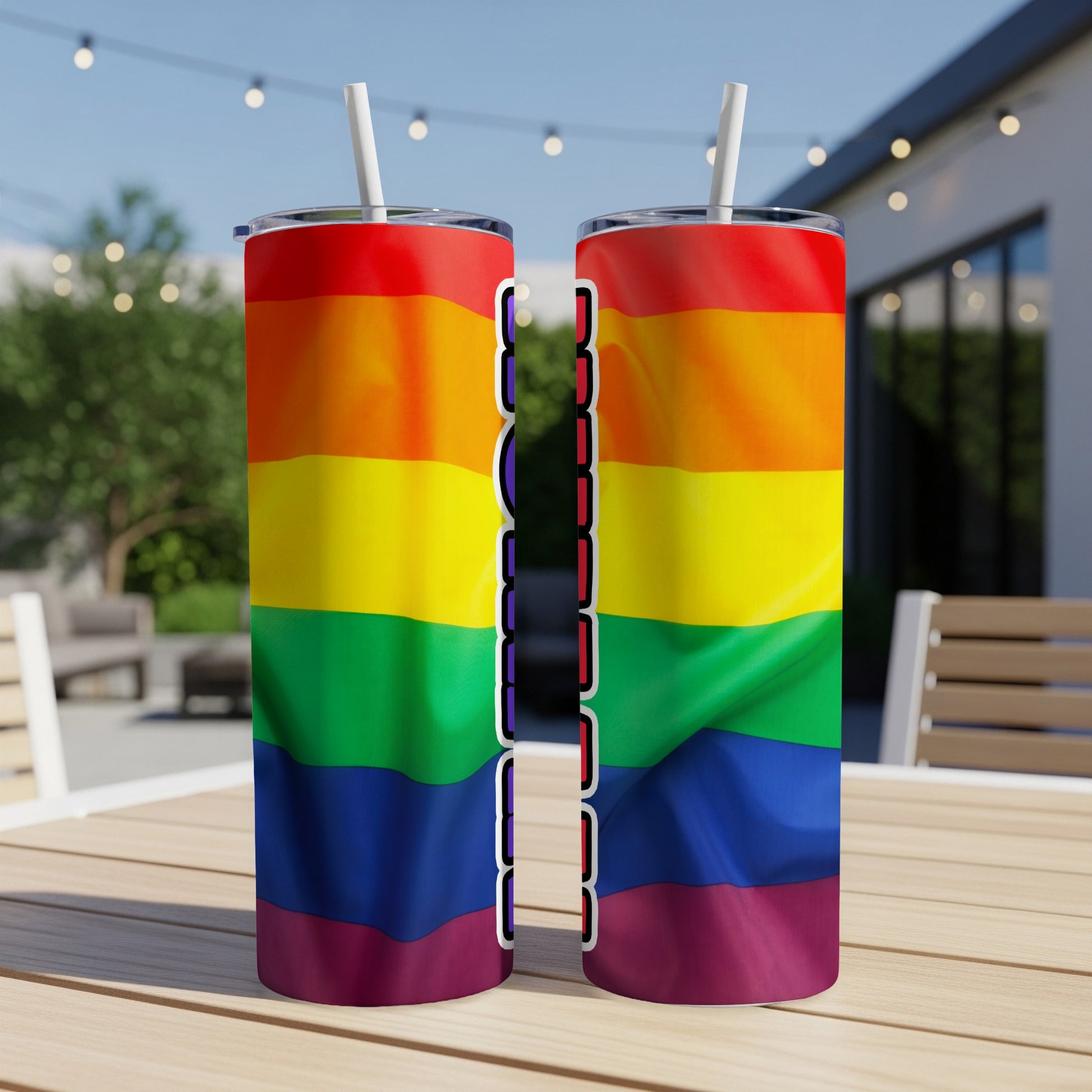 Rainbow pride flag tumbler with colorful text.