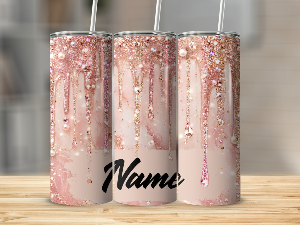 Three tumblers with a pink marble and glitter drip design and a space for personalization.