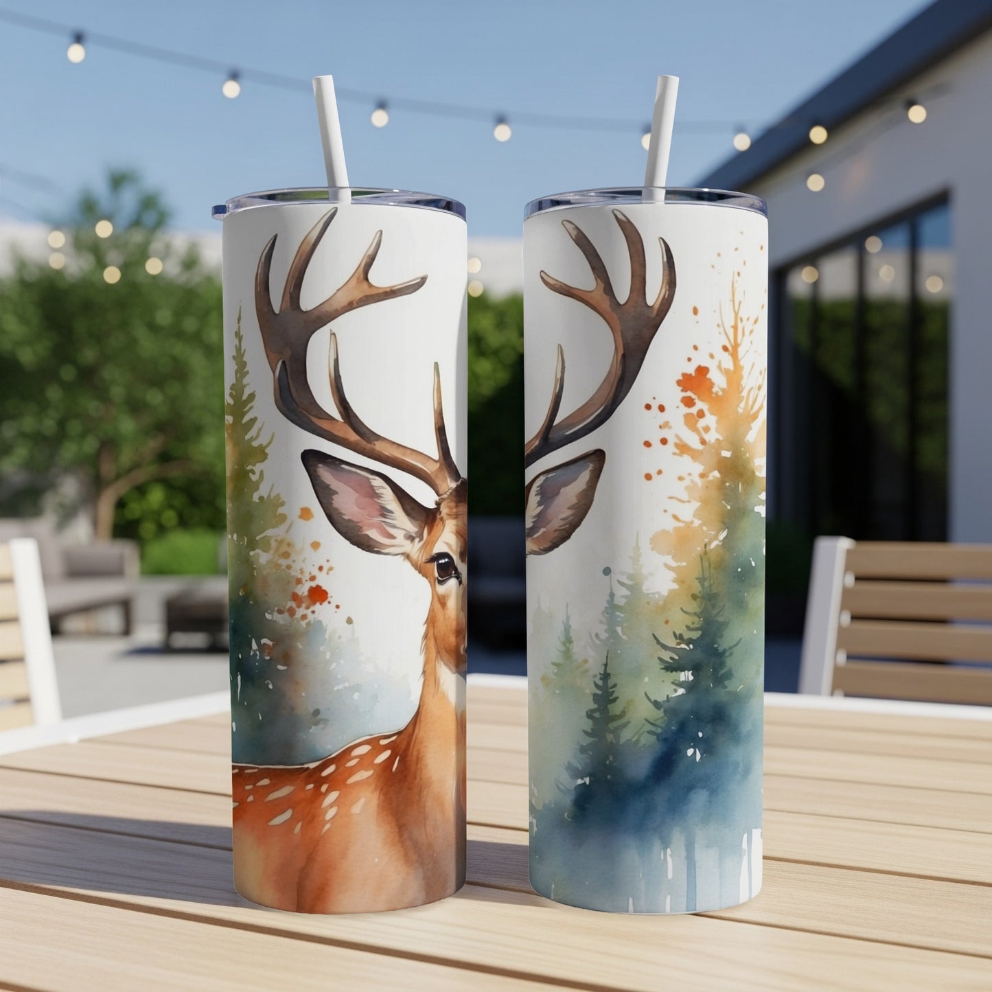 Two tumblers with deer and forest watercolor art, one showing a deer's face.