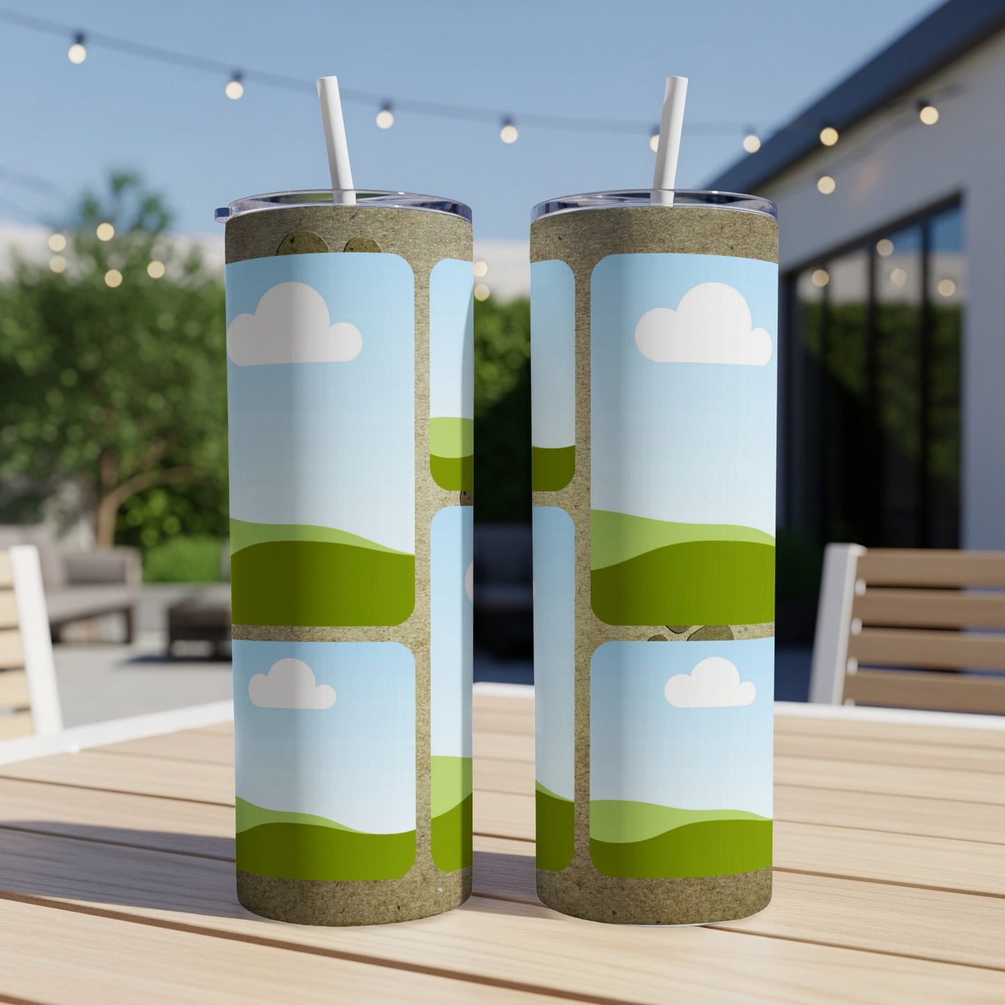 Two tumblers with a sky and rolling green hills design.