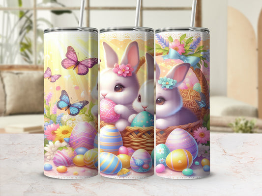 Three Easter-themed tumblers featuring bunnies, colorful eggs, and flowers.