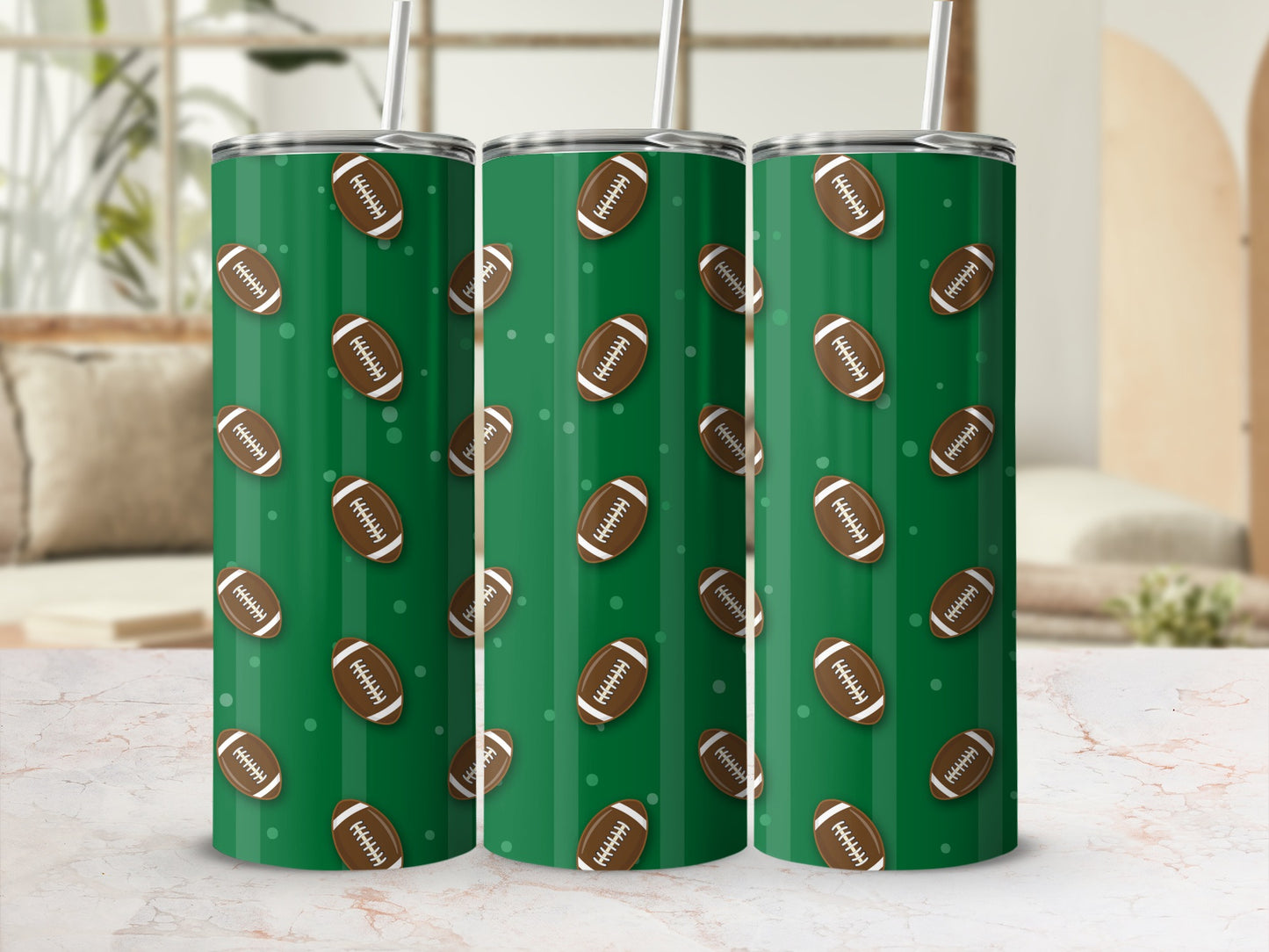 Green tumblers with repeating pattern of brown footballs and white circles.