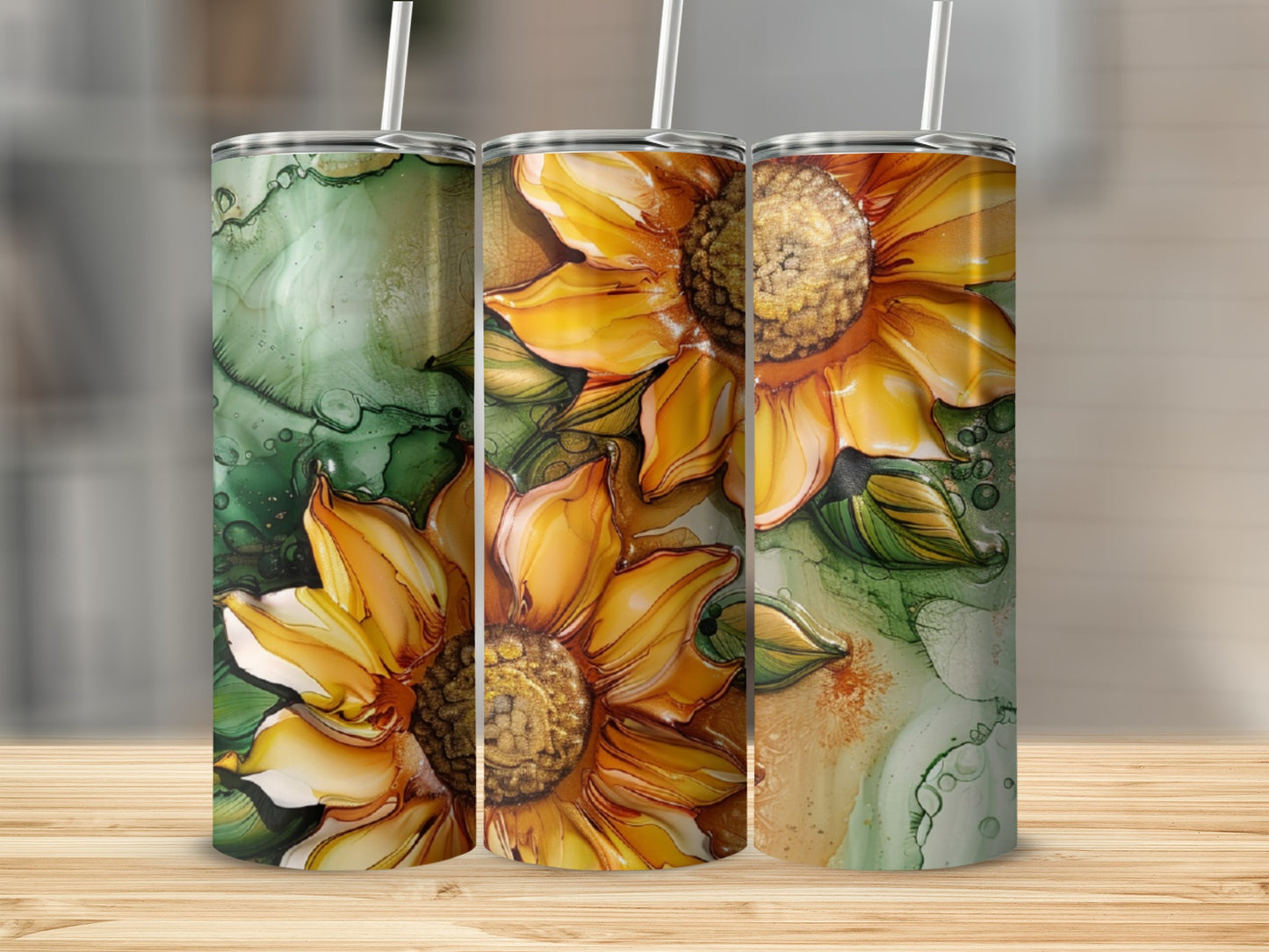 Three tumblers with sunflower and alcohol ink designs.