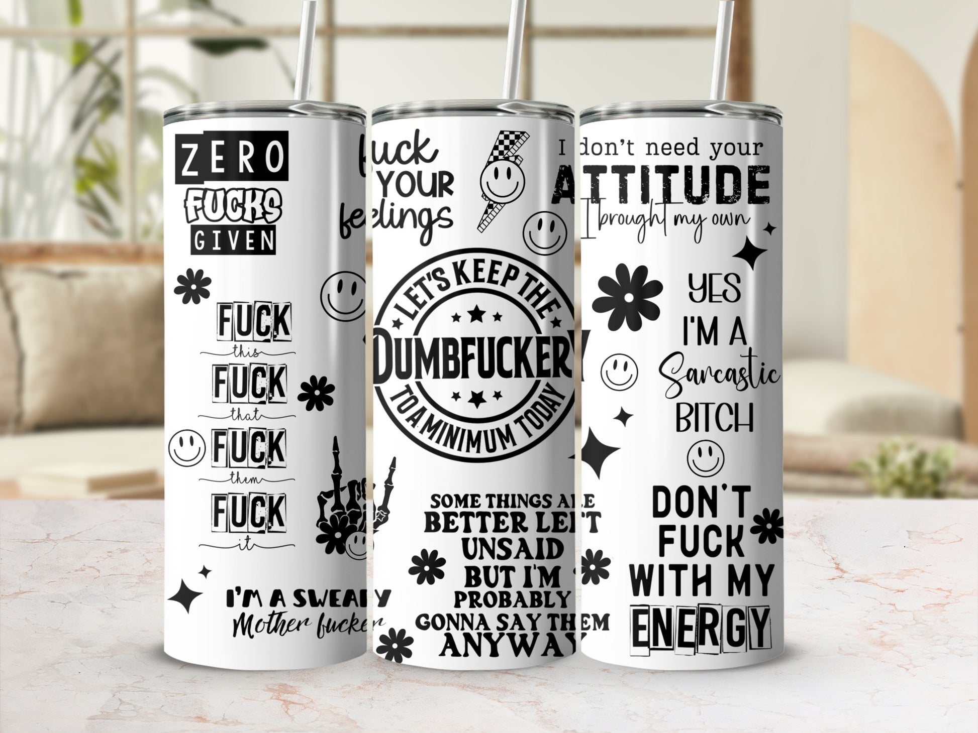 Three tumblers with humorous sayings, including "Zero Fucks Given" and "Don't Fuck With My Energy."