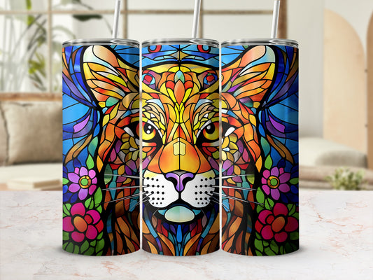 Three colorful tumblers featuring a stained-glass style lion face and flowers.