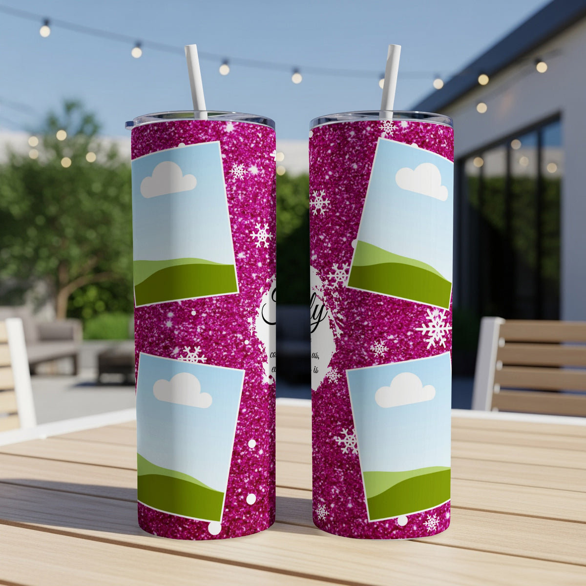 Two tumblers with a pink glitter design, photo frames, and snowflakes.