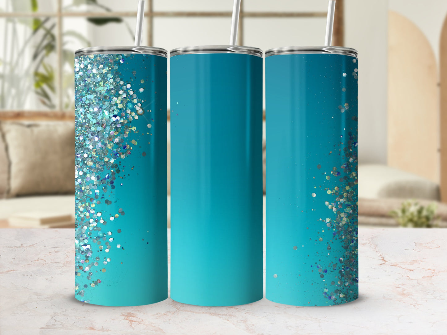 Three teal tumblers with glitter designs on the left and right sides.