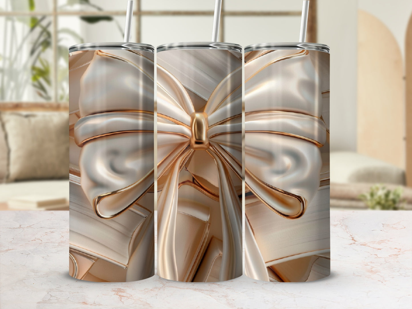 Three tumblers with a champagne-colored ribbon bow design.