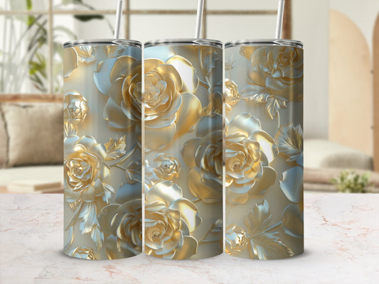Three metallic rose-patterned tumblers with straws.