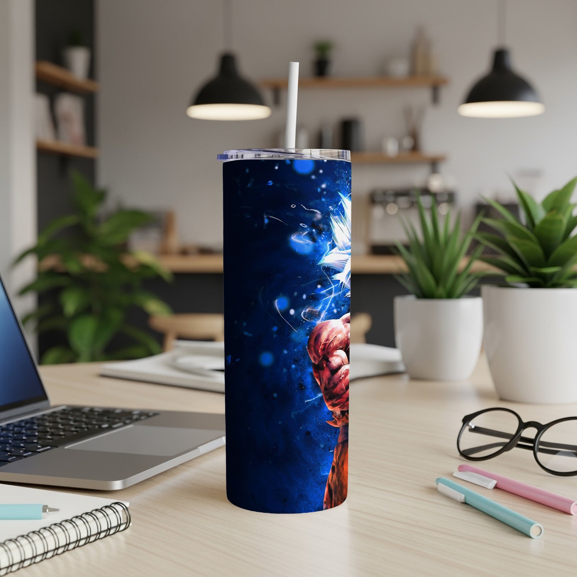 Dragon Ball Z Goku character art on a blue and black abstract design tumbler.