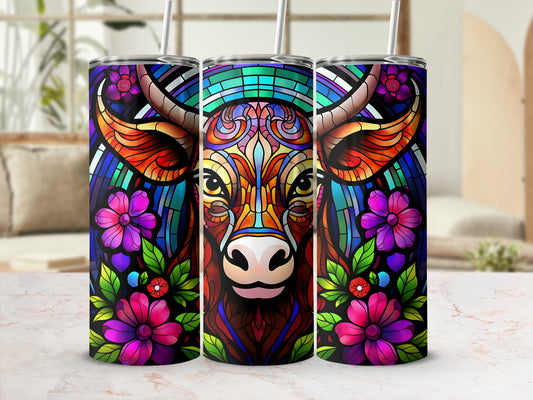 Stained glass style bull with colorful flowers on a tumbler.
