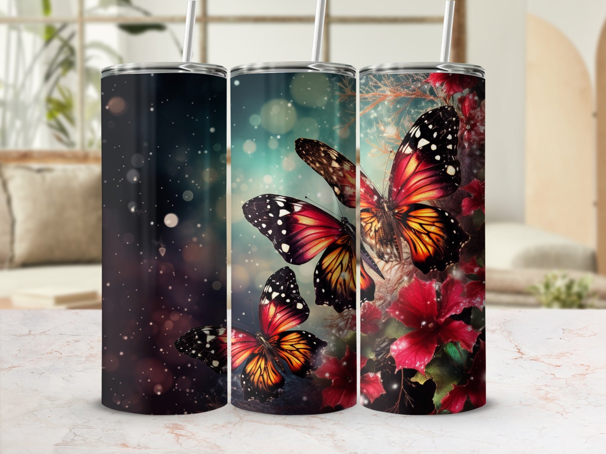Three tumblers featuring colorful butterflies and floral elements.