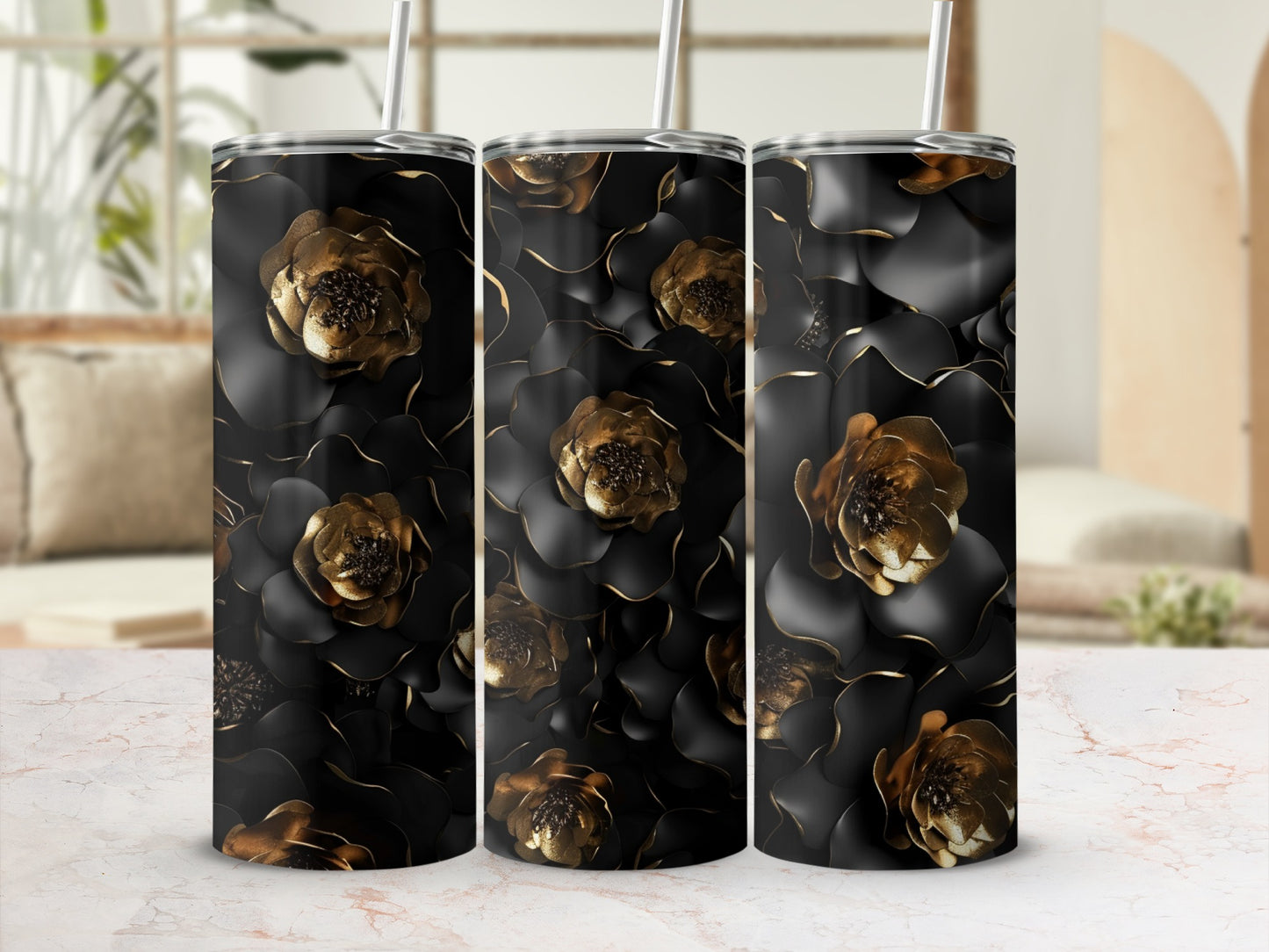 Triptych of black tumblers with embossed gold floral pattern.