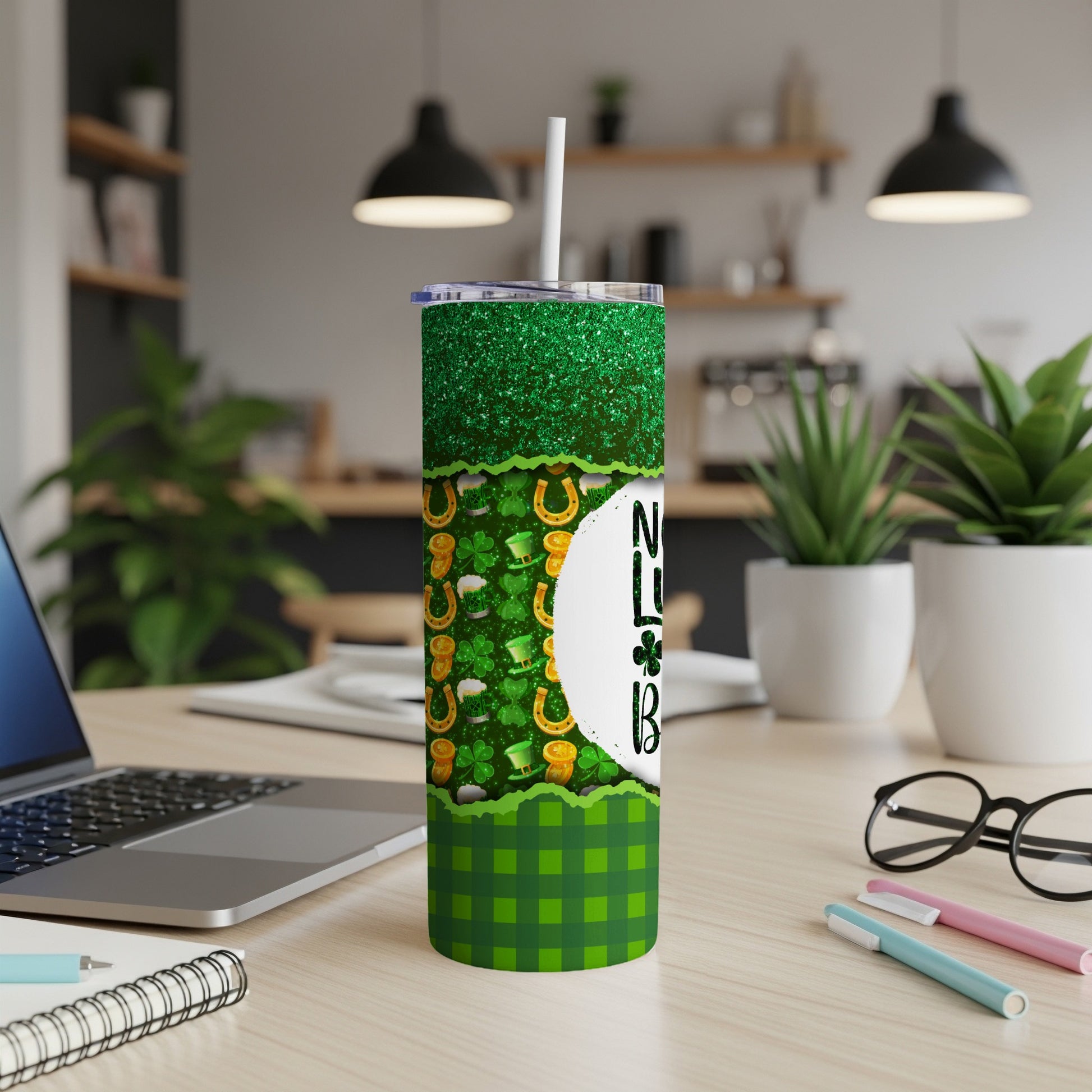 Green glitter and plaid St. Patrick's Day tumbler with shamrocks and horseshoes.