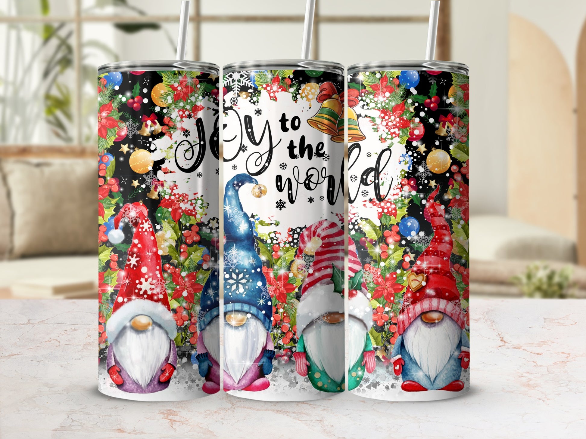 Four colorful Christmas gnomes on tumblers with "Joy to the world" text.
