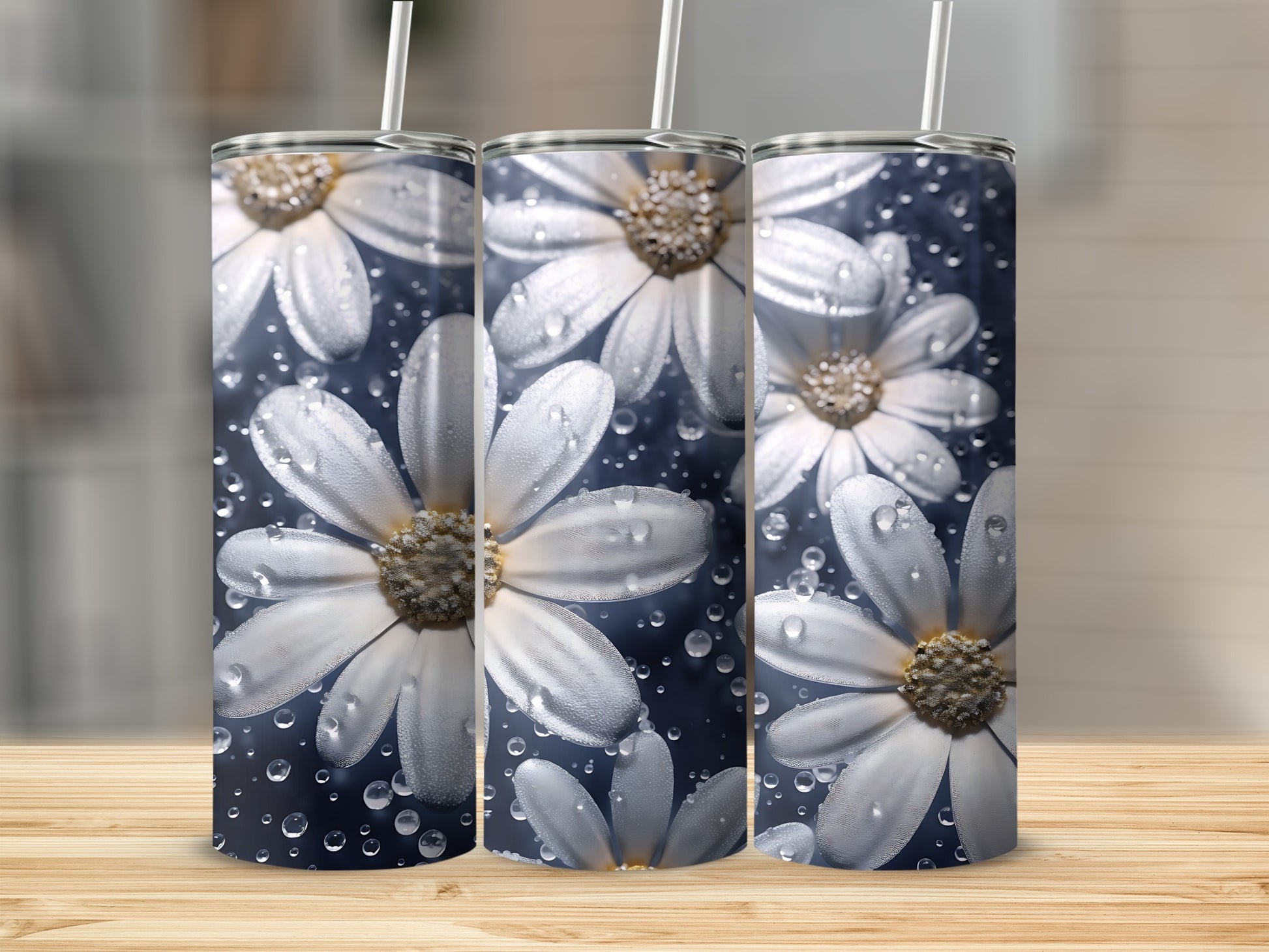Three tumblers with white daisies and water droplets on a dark blue background.