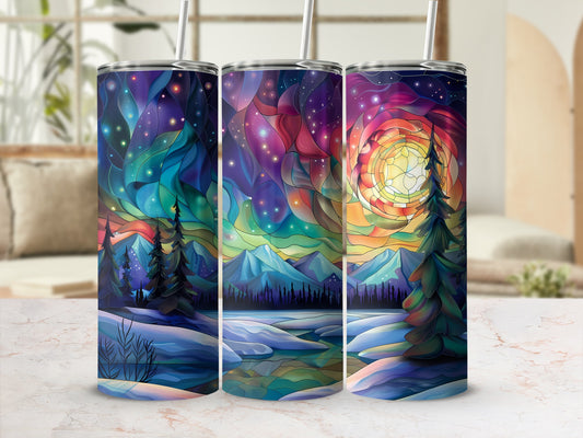 Three tumblers with aurora borealis and mountain landscape designs.