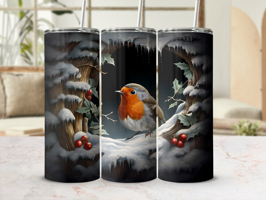Robin in snowy forest scene on a tumbler with straw