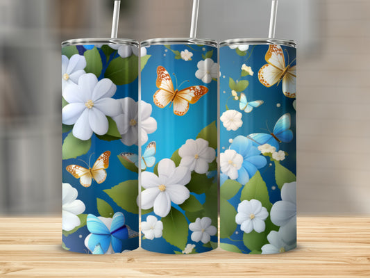 Three tumblers with a blue floral and butterfly design.