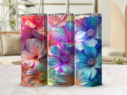 Three tumblers with vibrant floral designs in shades of pink, blue, and teal.