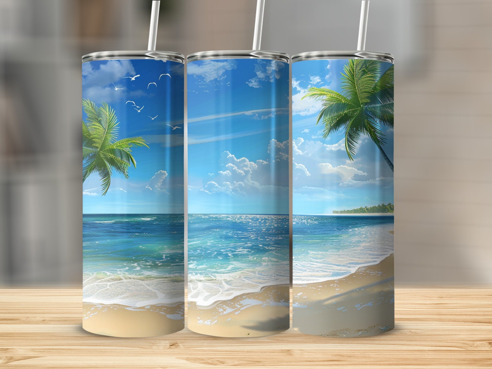 Three tumblers with a tropical beach scene and palm trees.