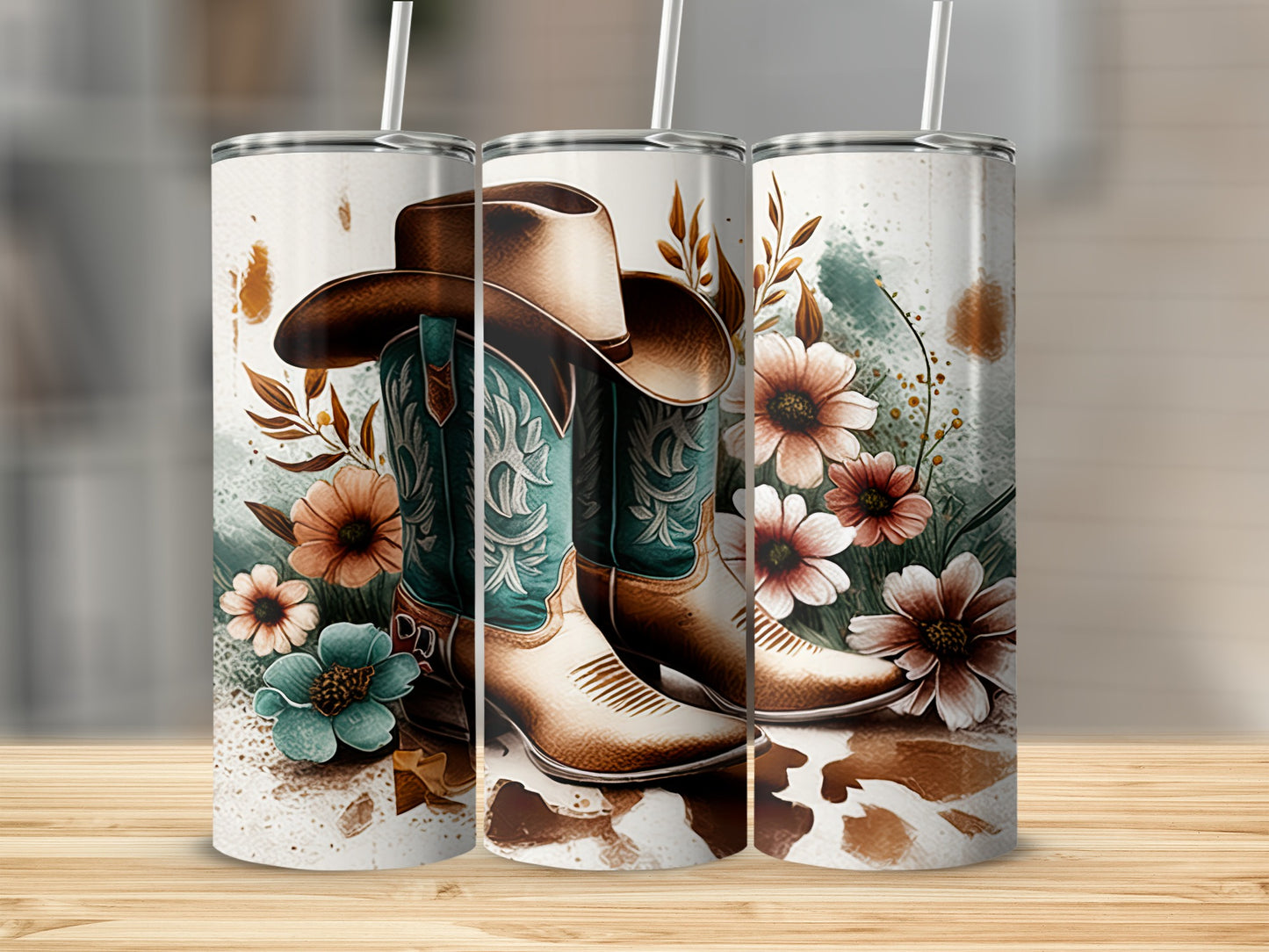 Cowboy boots and hat with floral accents on a wood surface.
