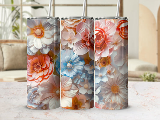 Three tumblers with floral designs in muted tones.
