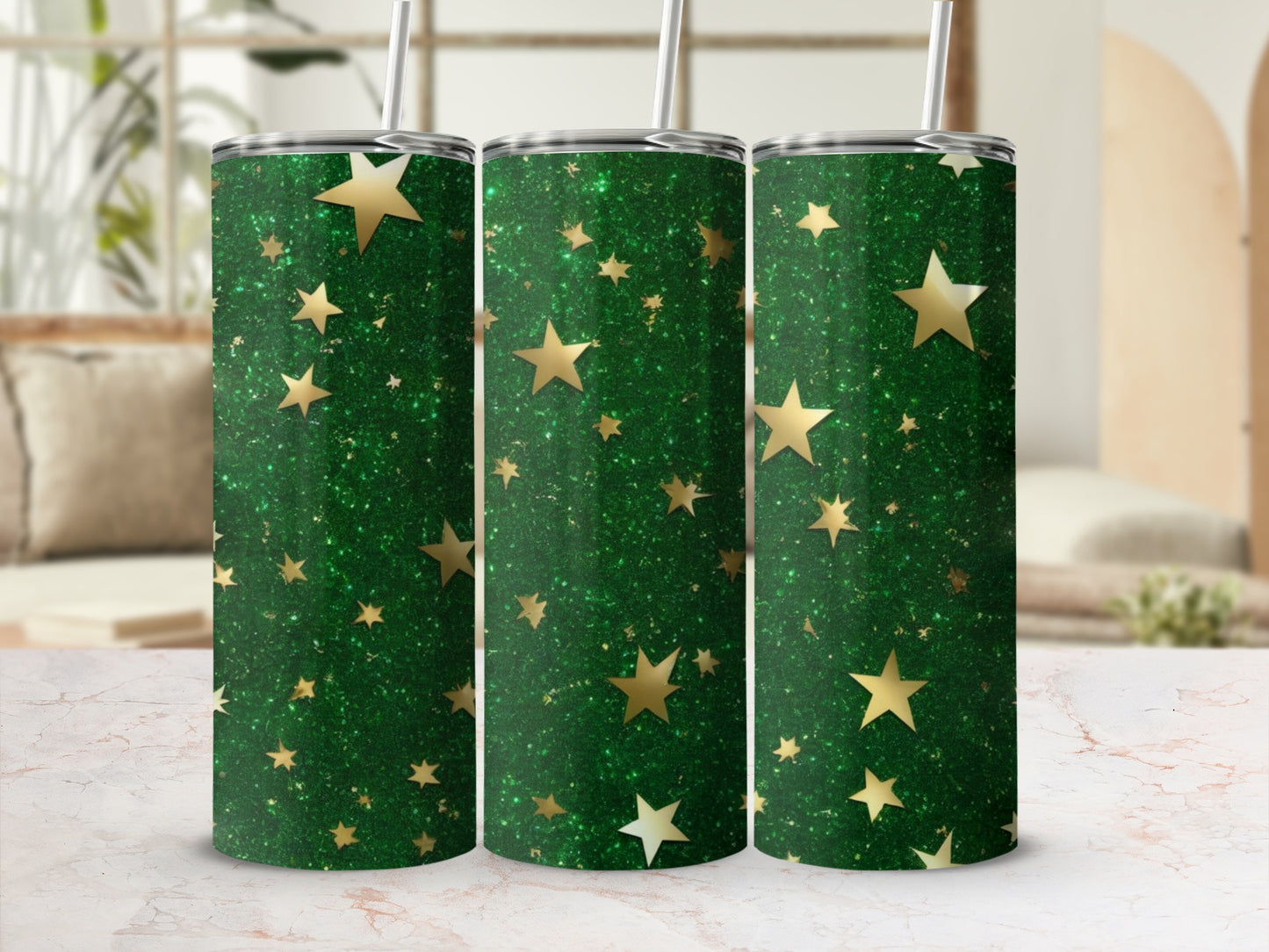 Three green tumblers with gold star glitter pattern.