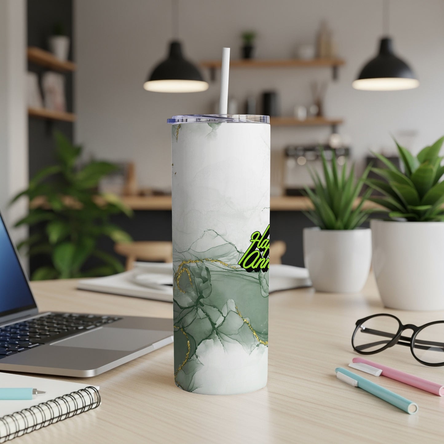 Green marble tumbler with gold accents and "Happy Anniversary" text.