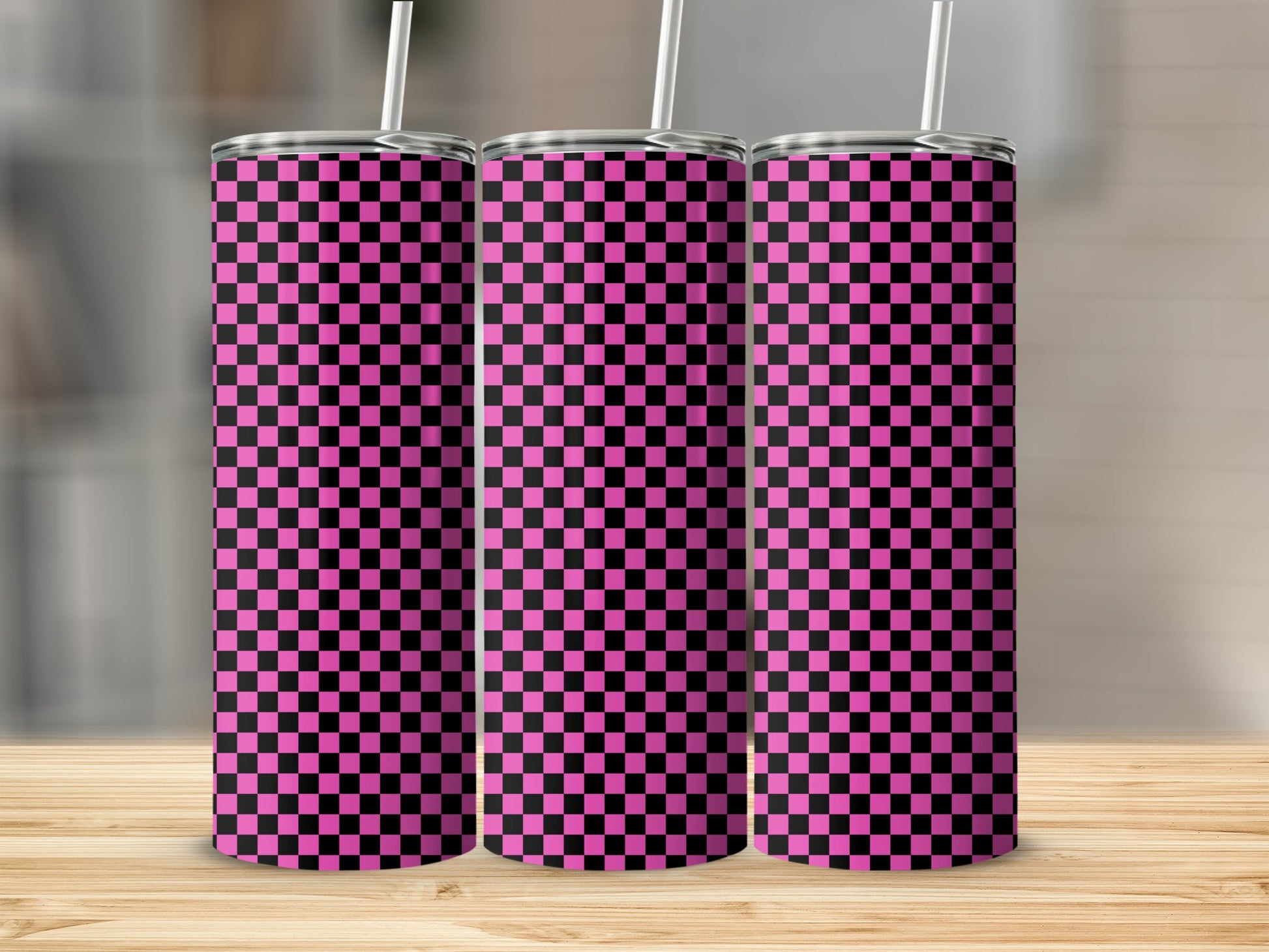 Three tumblers with a pink and black checkered pattern.