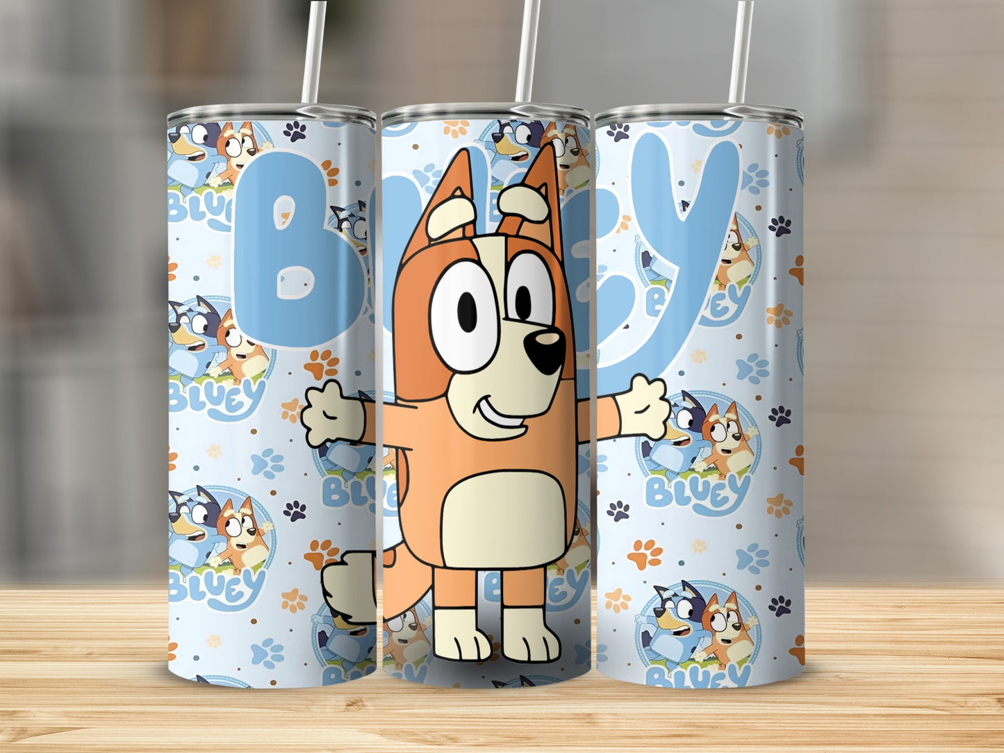 Bluey characters on a light blue patterned tumbler with straw.