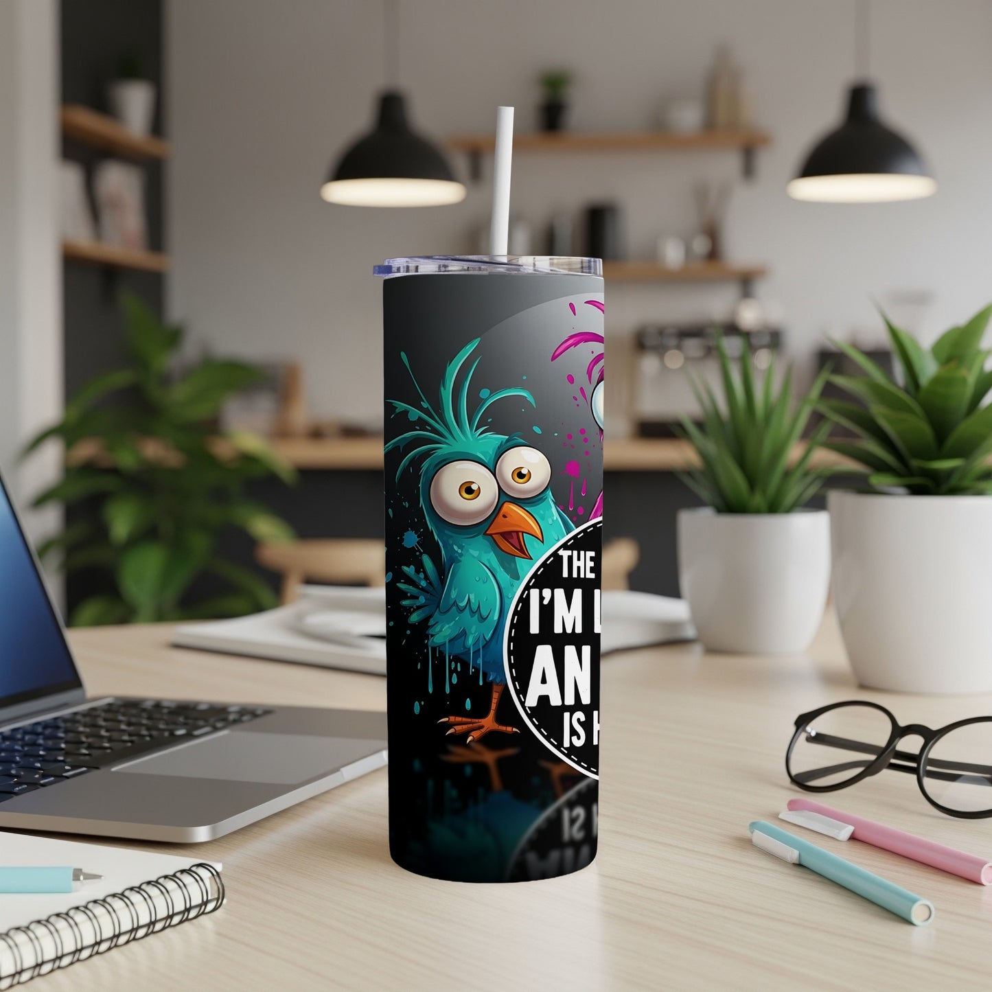 Tall tumbler with cartoon blue bird saying "The one I'm looking for is..."